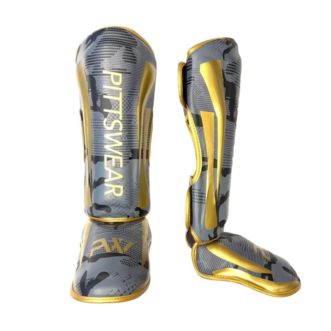 Schiennbeinschoner von PittsWear in den Farben Schwarz und Grau und Gold